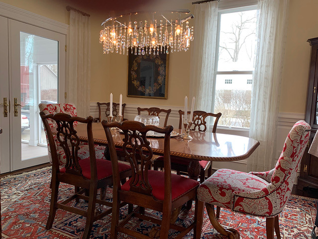rustic dining room with hints of red and warm wood